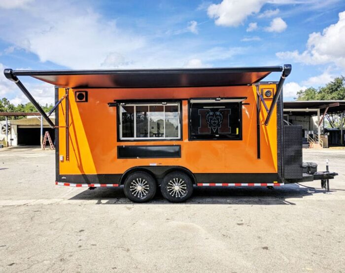 2024 Southern Dimensions 8.5X18 Orange and Black Full Food Trailer - Image 1